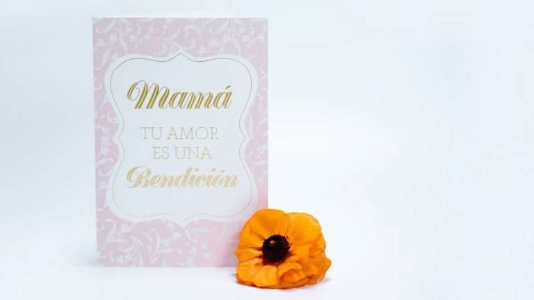 Chic Mother's Day card with 'Love is a blessing' text and a vibrant yellow flower.